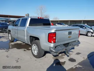 2018 Chevrolet Silverado 1500 LT with VIN 3GCPCRECXJG159263, listed as a IAAI auction lot 41856210 with 184,020 mi miles. Bid and sale history available at carsss.com. Image 3.