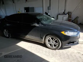 2018 Ford Fusion SE z VIN 3FA6P0HDXJR130677, wystawiony jako Copart lot #51737345 z przebiegiem 129 918 mil mil oraz Szkoda całkowita • Salvage title. Historia ofert i sprzedaży dostępna na DreamBid. Obrazek 4.