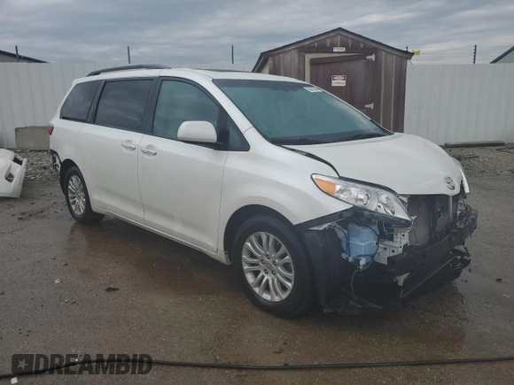 2015 Toyota Sienna XLE with VIN 5TDYK3DC6FS630405, listed as a Copart auction lot 59872045 with 60,306 mi miles and Salvage title. Bid and sale history available at DreamBid. Image 4.