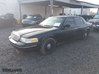 2005 Ford Crown Victoria LX with VIN 2FAFP74W45X127975, listed as a IAAI auction lot 41521670 with 289,438 mi miles. Bid and sale history available at carsss.com. Image 2.