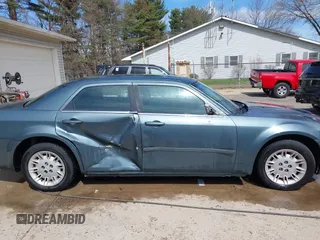 2005 Chrysler 300 with VIN 2C3JA43R45H616682, listed as a IAAI auction lot 41853835 with 158,464 mi miles. Bid and sale history available at carsss.com. Image 13.