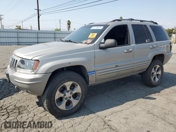 2001 Jeep Grand Cherokee Limited with VIN 1J4GW58N11C721108, listed as a Copart auction lot 60176915 with 257,907 mi miles and Salvage title. Bid and sale history available at DreamBid. Image 1.