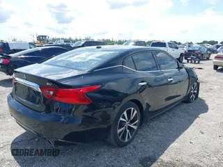 2017 Nissan Maxima SV z VIN 1N4AA6AP8HC400663, wystawiony jako IAAI lot #40285351 z przebiegiem 72 583 mil mil oraz . Historia ofert i sprzedaży dostępna na DreamBid. Obrazek 4.