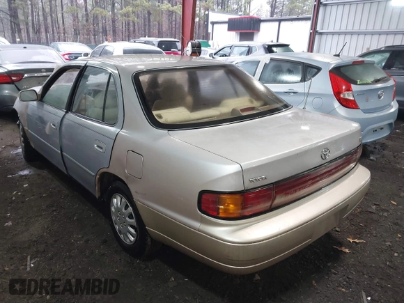 1994 Toyota Camry LE with VIN 4T1SK12E3RU863068, listed as a IAAI auction lot 41246198 with 109,786 mi miles. Bid and sale history available at carsss.com. Image 3.