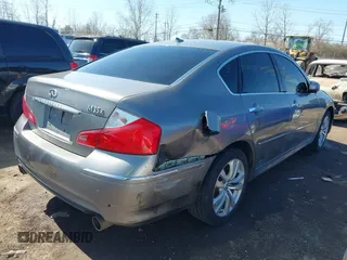 2010 Infiniti M with VIN JN1CY0AR7AM960352, listed as a IAAI auction lot 41754408 with 227,408 mi miles. Bid and sale history available at carsss.com. Image 4.