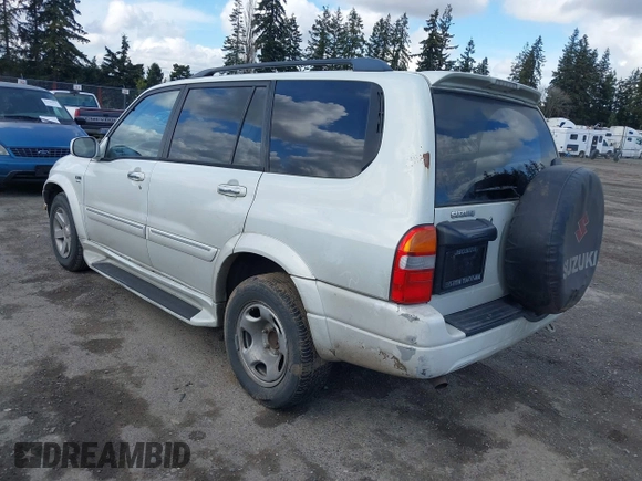 2003 Suzuki XL7 Touring with VIN JS3TX92V634111253, listed as a IAAI auction lot 41689146 with 255,861 mi miles and . Bid and sale history available at DreamBid. Image 3.