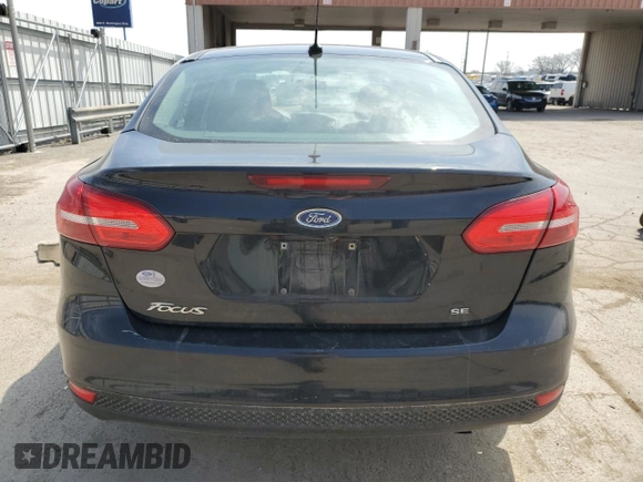 2017 Ford Focus SE with VIN 1FADP3F21HL204250, listed as a Copart auction lot 53553325 with 76,317 mi miles and Salvage title. Bid and sale history available at DreamBid. Image 6.