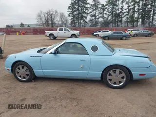 2003 Ford Thunderbird Deluxe z VIN 1FAHP60A53Y101461, wystawiony jako IAAI lot #41797831 z przebiegiem 64 760 mil mil oraz . Historia ofert i sprzedaży dostępna na DreamBid. Obrazek 15.