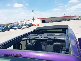 2023 Jeep Wrangler High Altitude z VIN 1C4HJXEN9PW560958, wystawiony jako IAAI lot #42393559 z przebiegiem 35 981 mil mil oraz . Historia ofert i sprzedaży dostępna na DreamBid. Obrazek 19.