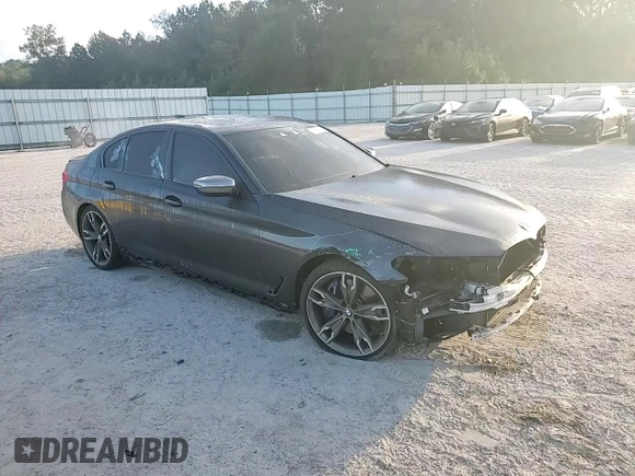 2019 BMW 5 Series M550i xDrive with VIN WBAJB9C57KB288906, listed as a Copart auction lot 79846274 with 61,744 mi miles and Salvage title. Bid and sale history available at DreamBid. Image 11.