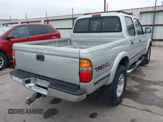 2002 Toyota Tacoma PreRunner with VIN 5TEGN92N42Z888865, listed as a IAAI auction lot 41674113 with 229,651 mi miles and . Bid and sale history available at DreamBid. Image 4.