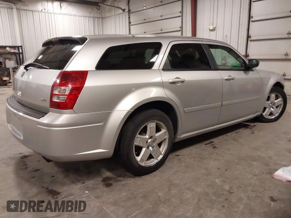 2005 Dodge Magnum z VIN 2DRGZR8V15H587486, wystawiony jako IAAI lot #42040578 z przebiegiem 179 158 mil mil oraz . Historia ofert i sprzedaży dostępna na DreamBid. Obrazek 4.