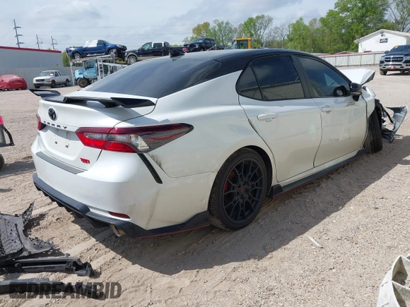 2022 Toyota Camry TRD with VIN 4T1KZ1AK6NU069341, listed as a IAAI auction lot 41881252 with 55,871 mi miles and . Bid and sale history available at DreamBid. Image 4.