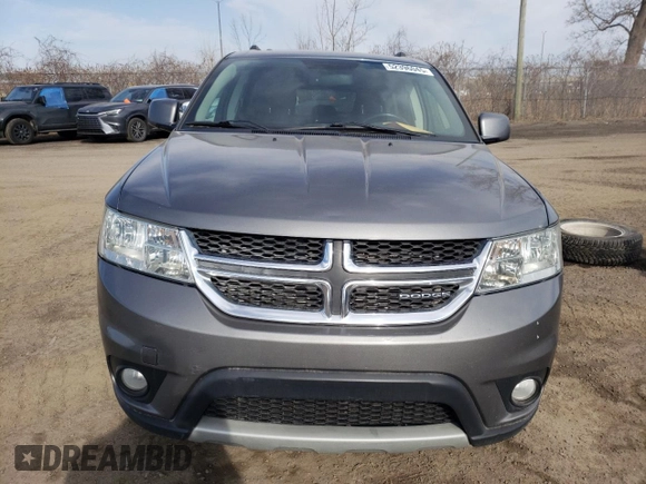2012 Dodge Journey SXT z VIN 3C4PDCCGXCT177675, wystawiony jako Copart lot #52396045 z przebiegiem 168 203 mil mil oraz Szkoda całkowita • Salvage title. Historia ofert i sprzedaży dostępna na DreamBid. Obrazek 5.