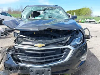 2019 Chevrolet Equinox LT z VIN 3GNAXUEV1KL297594, wystawiony jako IAAI lot #42165836 z przebiegiem 85 519 mil mil oraz . Historia ofert i sprzedaży dostępna na DreamBid. Obrazek 12.