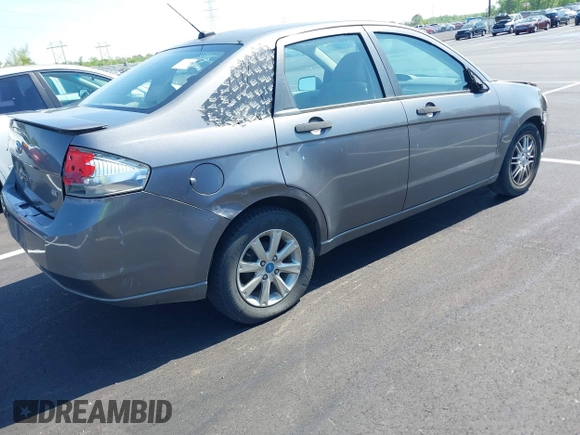 2009 Ford Focus SE with VIN 1FAHP35N19W246382, listed as a IAAI auction lot 42043020 with 197,707 mi miles. Bid and sale history available at carsss.com. Image 4.