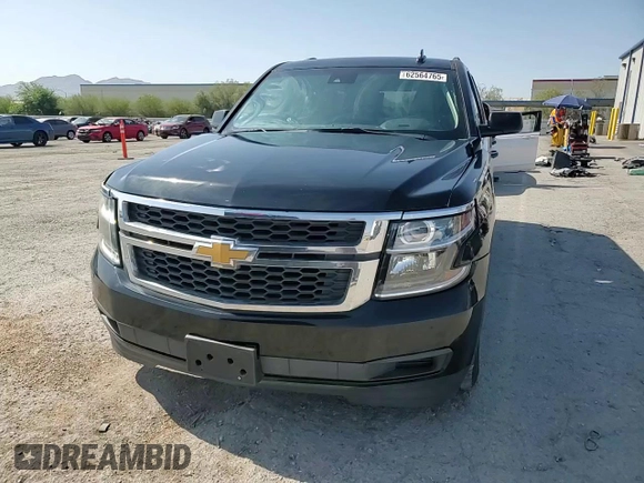 2015 Chevrolet Suburban LT with VIN 1GNSCJKC9FR732720, listed as a Copart auction lot 62564765 with 99,194 mi miles and Salvage title. Bid and sale history available at DreamBid. Image 14.