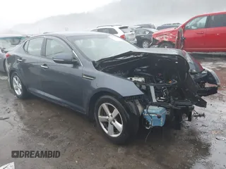 2015 Kia Optima LX z VIN KNAGM4A75F5607476, wystawiony jako IAAI lot #41454452 z przebiegiem 157 051 mil mil oraz . Historia ofert i sprzedaży dostępna na DreamBid. Obrazek 1.