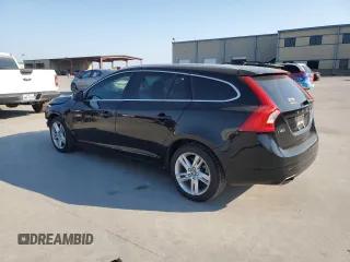2015 Volvo V60 T5 Drive-E Premier with VIN YV140MEBXF1207382, listed as a Copart auction lot 75951574 with 96,905 mi miles and Salvage Title. Bid and sale history available at carsss.com. Image 2.