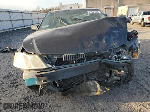 2001 Toyota Avalon XL z VIN 4T1BF28B61U175674, wystawiony jako Copart lot #49913765 z przebiegiem 170 245 mil mil oraz Tytuł czysty. Historia ofert i sprzedaży dostępna na DreamBid. Obrazek 5.