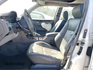 2001 Mercedes-Benz E-Class with VIN WDBJF70J11B285493, listed as a Copart auction lot 77170114 with 226,226 mi miles and Salvage Title. Bid and sale history available at carsss.com. Image 7.