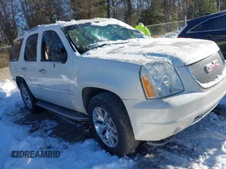 2014 GMC Yukon Denali with VIN 1GKS2EEF3ER181504, listed as a IAAI auction lot 41267224 with 165,478 mi miles. Bid and sale history available at carsss.com. Image 1.
