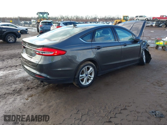 2018 Ford Fusion SE z VIN 3FA6P0HD7JR259606, wystawiony jako IAAI lot #41649797 z przebiegiem 94 094 mil mil oraz . Historia ofert i sprzedaży dostępna na DreamBid. Obrazek 4.