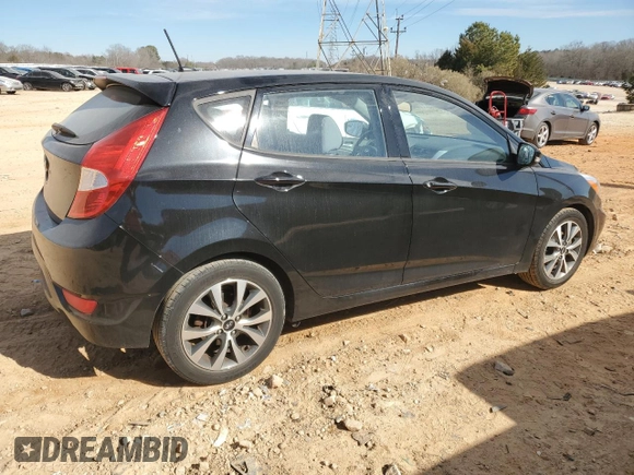 2015 Hyundai Accent Sport with VIN KMHCU5AE9FU233087, listed as a Copart auction lot 43356795 with 107,140 mi miles and Clean Title. Bid and sale history available at carsss.com. Image 3.
