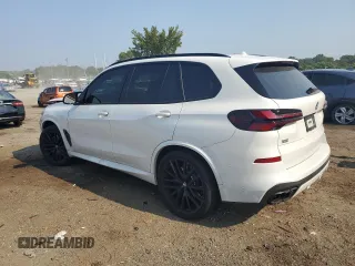 2024 BMW X5 M60i with VIN 5UX33EU04R9U00310, listed as a Copart auction lot 65352824 with 16,088 mi miles and Salvage Title. Bid and sale history available at carsss.com. Image 2.