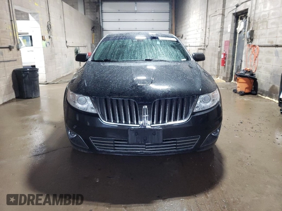 2011 Lincoln MKS EcoBoost with VIN 1LNHL9FT2BG609077, listed as a Copart auction lot 59341025 with 184,591 mi miles and Salvage title. Bid and sale history available at DreamBid. Image 5.