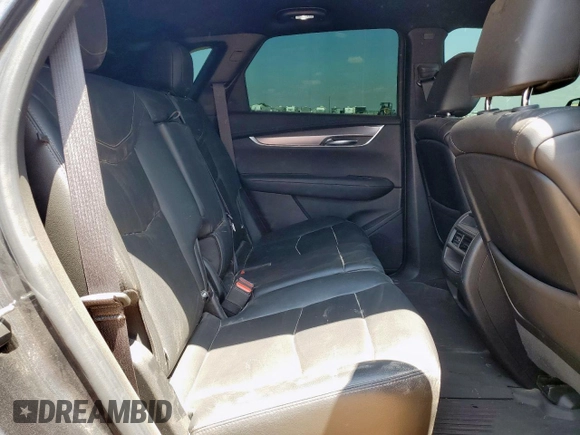 2020 Cadillac XT5 Luxury FWD z VIN 1GYKNAR47LZ173823, wystawiony jako Copart lot #56770025 z przebiegiem 74 192 mil mil oraz Szkoda całkowita • Salvage title. Historia ofert i sprzedaży dostępna na DreamBid. Obrazek 11.
