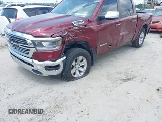 2019 Ram 1500 Laramie z VIN 1C6SRFJTXKN652650, wystawiony jako IAAI lot #42553987 z przebiegiem 78 609 mil mil oraz . Historia ofert i sprzedaży dostępna na DreamBid. Obrazek 6.