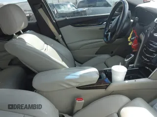 2014 Cadillac XTS Premium with VIN 2G61P5S38E9124277, listed as a IAAI auction lot 41744734 with 136,223 mi miles. Bid and sale history available at carsss.com. Image 5.