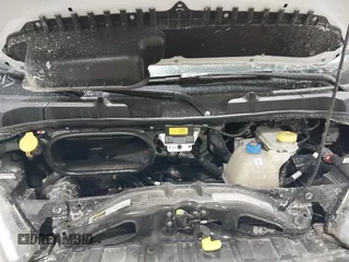 2024 Ram ProMaster Cargo Tradesman with VIN 3C6LRVDG4RE139986, listed as a IAAI auction lot 41273028 with 10,870 mi miles and . Bid and sale history available at DreamBid. Image 10.