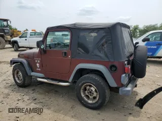 2002 Jeep Wrangler X z VIN 1J4FA39S42P773815, wystawiony jako Copart lot #60016255 z przebiegiem 174 803 mil mil oraz Szkoda całkowita • Salvage title. Historia ofert i sprzedaży dostępna na DreamBid. Obrazek 2.