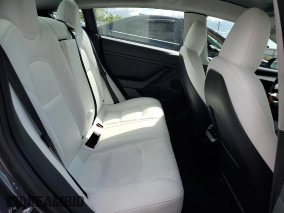 2023 Tesla Model 3 z VIN 5YJ3E1EA0PF677471, wystawiony jako Copart lot #57661625 z przebiegiem 20 326 mil mil oraz Szkoda całkowita • Salvage title. Historia ofert i sprzedaży dostępna na DreamBid. Obrazek 10.