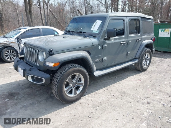 2018 Jeep Wrangler Unlimited Sahara z VIN 1C4HJXEN8JW329816, wystawiony jako IAAI lot #42055851 z przebiegiem 70 298 mil mil oraz . Historia ofert i sprzedaży dostępna na DreamBid. Obrazek 2.
