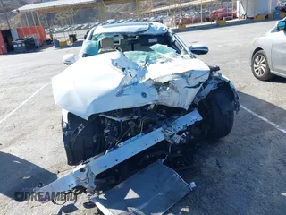 2019 Mercedes-Benz E 300 with VIN WDDZF4JB8KA505980, listed as a IAAI auction lot 41611693 with Not Provided miles and . Bid and sale history available at DreamBid. Image 12.