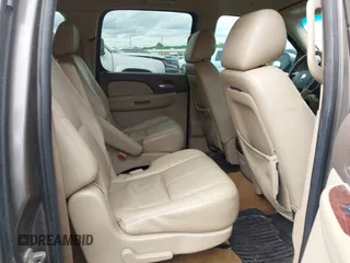 2011 Chevrolet Suburban LT with VIN 1GNSCJE03BR267184, listed as a IAAI auction lot 42156424 with 307,618 mi miles. Bid and sale history available at carsss.com. Image 8.