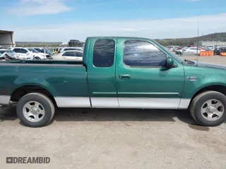 2000 Ford F-150 Work Series with VIN 1FTRX17W8YKA87939, listed as a IAAI auction lot 41882284 with 1 mi miles. Bid and sale history available at carsss.com. Image 14.