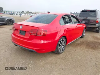 2014 Volkswagen Jetta GLI with VIN 3VW4T7AJ2EM246347, listed as a IAAI auction lot 42553341 with 140,793 mi miles and . Bid and sale history available at DreamBid. Image 4.