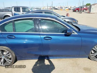 2021 BMW 3 Series 330i z VIN 3MW5R1J03M8B71429, wystawiony jako IAAI lot #42290683 z przebiegiem Nie podano mil oraz . Historia ofert i sprzedaży dostępna na DreamBid. Obrazek 13.