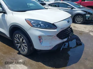 2020 Ford Escape Titanium z VIN 1FMCU9J90LUA39747, wystawiony jako IAAI lot #42369890 z przebiegiem 31 425 mil mil oraz . Historia ofert i sprzedaży dostępna na DreamBid. Obrazek 18.