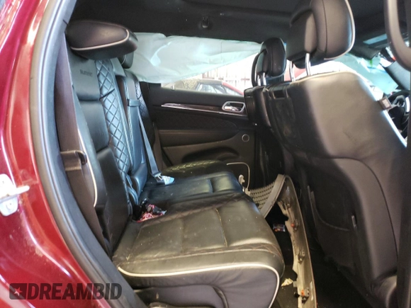 2019 Jeep Grand Cherokee Summit with VIN 1C4RJFJG8KC716651, listed as a Copart auction lot 63248974 with 91,177 mi miles and Salvage title. Bid and sale history available at DreamBid. Image 11.