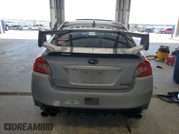 2016 Subaru WRX Premium z VIN JF1VA1E69G9828081, wystawiony jako Copart lot #63122085 z przebiegiem 52 984 mil mil oraz Szkoda całkowita • Salvage title. Historia ofert i sprzedaży dostępna na DreamBid. Obrazek 6.