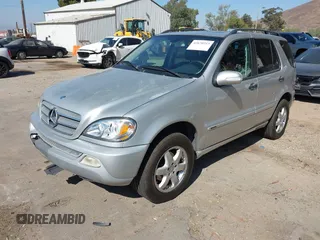 2003 Mercedes-Benz M 350 with VIN 4JGAB57EX3A438290, listed as a IAAI auction lot 42670213 with 246,915 mi miles and . Bid and sale history available at DreamBid. Image 2.
