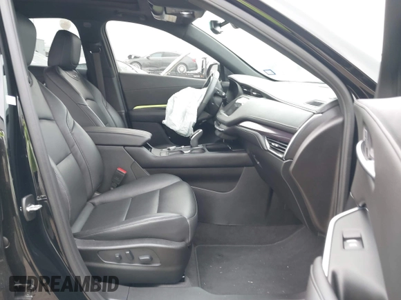 2023 Cadillac XT4 FWD Luxury with VIN 1GYAZAR49PF128552, listed as a IAAI auction lot 41806172 with 36,081 mi miles and . Bid and sale history available at carsss.com. Image 5.