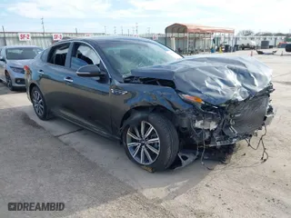 2019 Kia Optima LX with VIN 5XXGT4L3XKG376676, listed as a IAAI auction lot 41679981 with 57,211 mi miles. Bid and sale history available at carsss.com. Image 1.