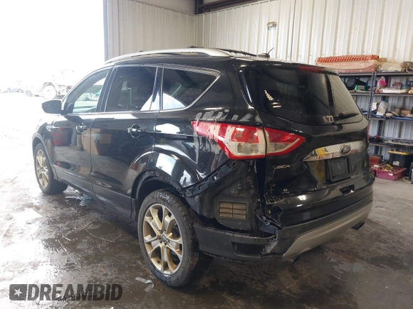 2015 Ford Escape Titanium with VIN 1FMCU9J98FUC70495, listed as a IAAI auction lot 41978543 with 129,974 mi miles. Bid and sale history available at carsss.com. Image 3.