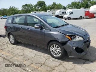 2015 Mazda 5 Sport с VIN JM1CW2BL4F0184530, выставлен на аукционе Copart как лот 56965755 с пробегом 144 873 миль миль и Списание • Salvage title. История ставок и продаж доступна на DreamBid. Изображение 4.